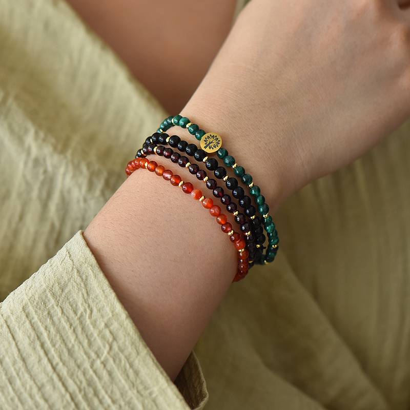 Protection & Stability 4-Strand Crystal Bracelet β Malachite β’ Obsidian β’ Garnet β’ Carnelian